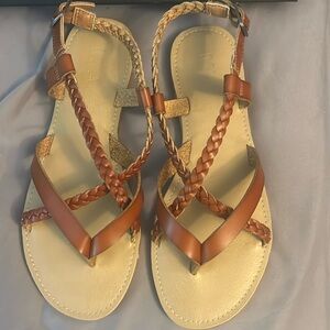 Brand new, never worn w/ the sticker still on the bottom of the shoes.